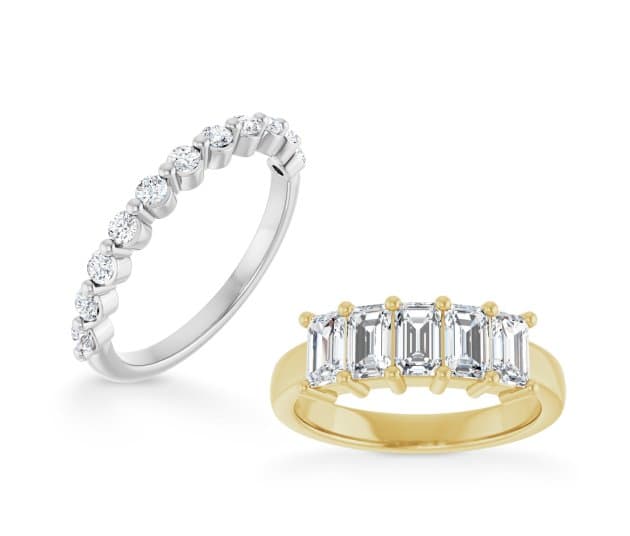 White metal round-diamond anniversary band and yellow gold five-stone emerald-cut diamond band