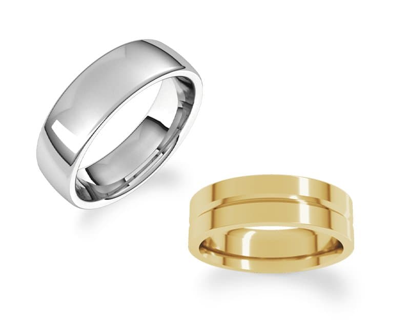Polished silver-toned domed wedding band and yellow gold band with parallel grooves