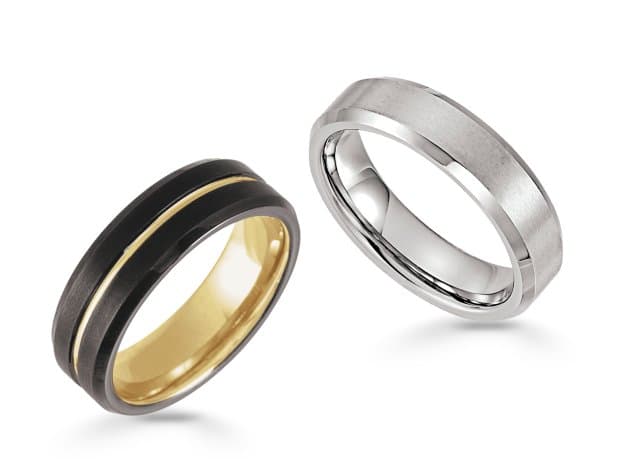 Black matte wedding band with gold inlay and silver-toned brushed band with polished bevels