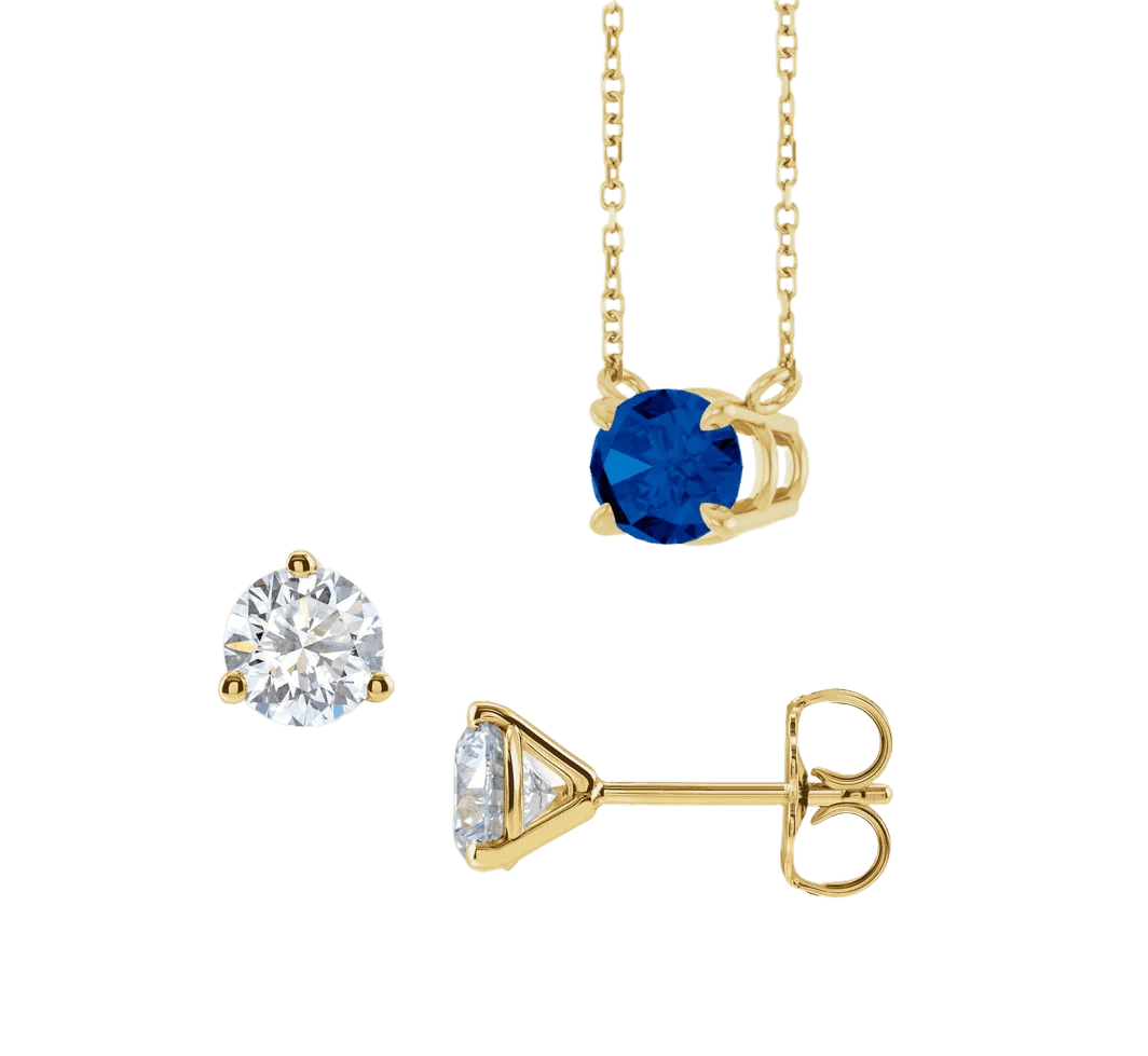 Yellow gold sapphire pendant and diamond stud earrings