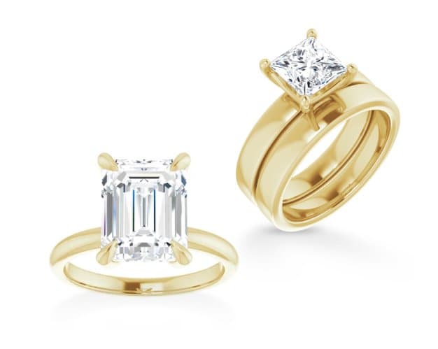 Yellow gold solitaire engagement rings with emerald-cut diamonds